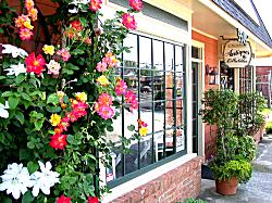 flowers in front of antique shop