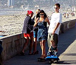family out for walk on boardwalk