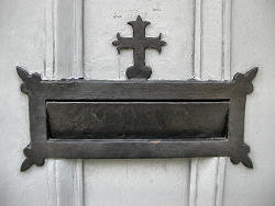 iron mail box on door