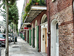 view down street along old brick storefronts