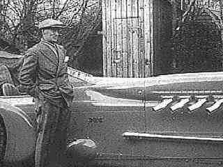 Dr. Stephen Ashley and his Batmobile at a roadside relief station