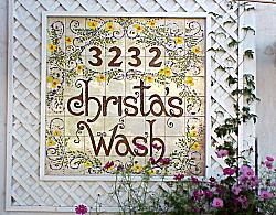 business sign Christa's Wash
