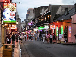 people on street at dusk