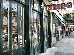 Relics sign on storefront window display