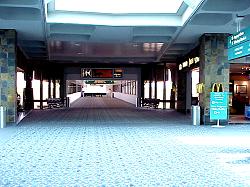 walkway to terminal inside airport