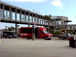 skybridge and red bus