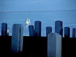 grave stones and sailboat