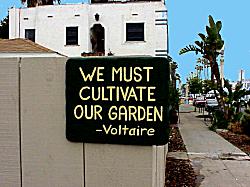We must cultivate our garden sign by Voltaire
