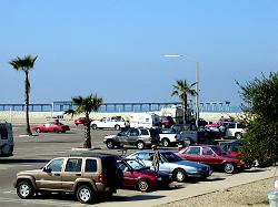 parking lot with pier behind