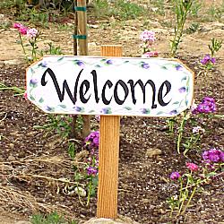 Welcome sign in community garden