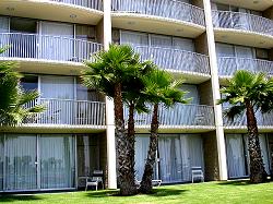 hotel rooms with balconies and views of water