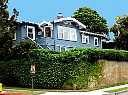 big blue craftsman on raised lot