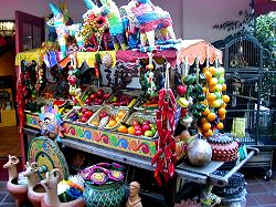 wagon of fruits and vegetables and gifts for sale