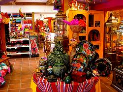 inside one of the shops showing displays of ceramics for sale
