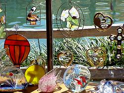 stained glass items for sale in shop window