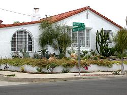 one level Spanish home with tile roof